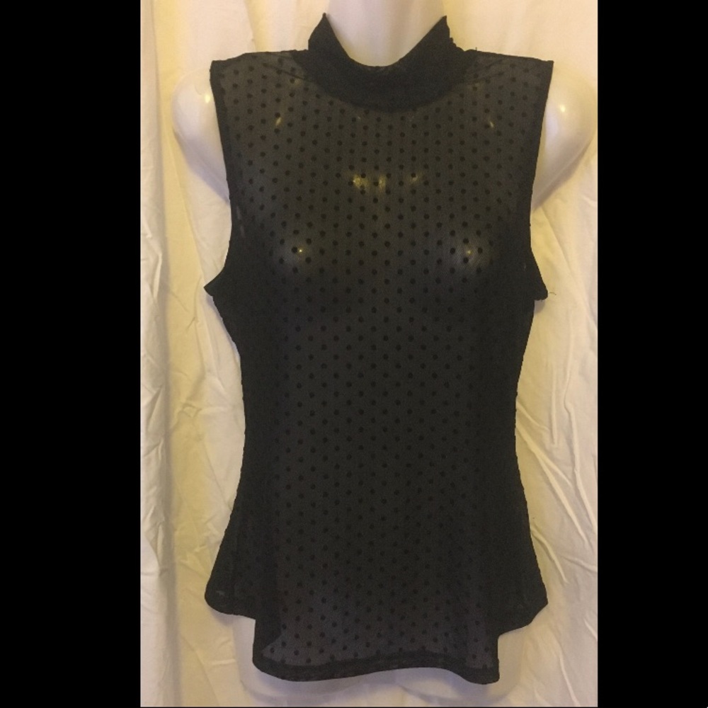 Black with polka dots sleeveless turtleneck